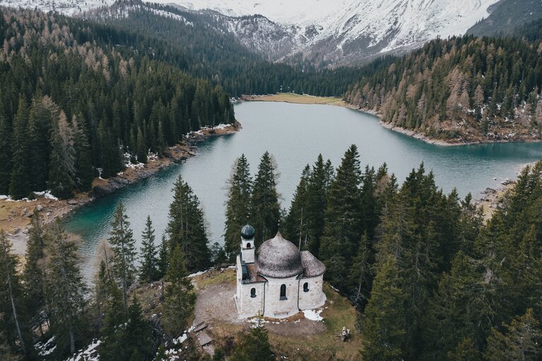 Obernbergersee with the Lake Chapel in Spring