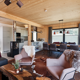Bergeralm Chalets Dining Table and Living Room | © Christian Horn